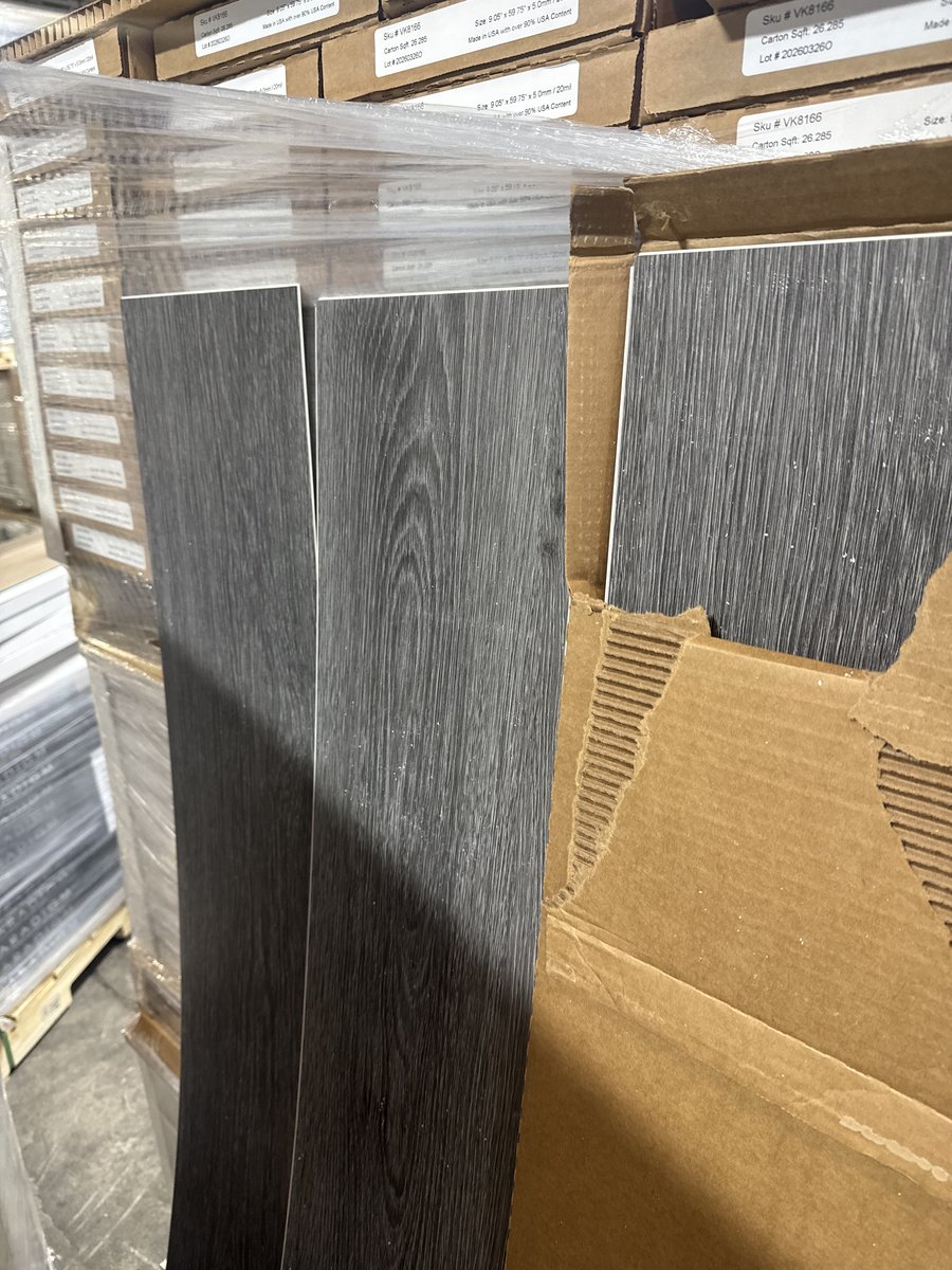 Charcoal Gray Wood Grain Vinyl Plank Flooring